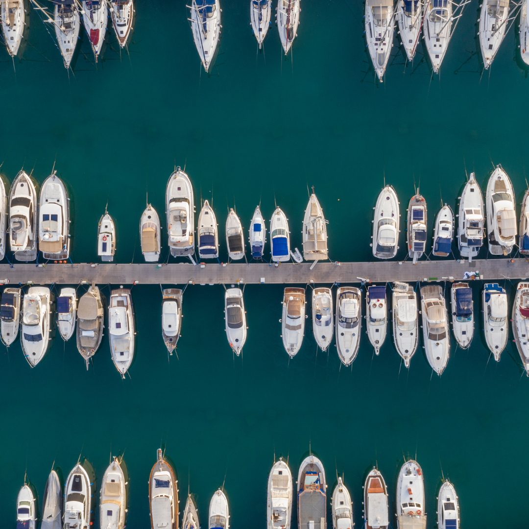 A marina full of boats from left to right.